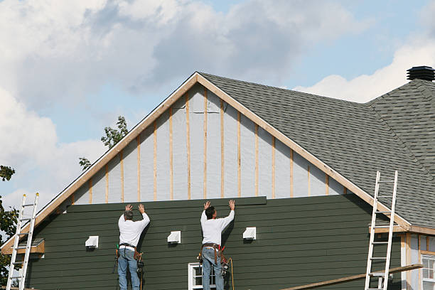 Professional Siding Installation technician working in Plainview, NY